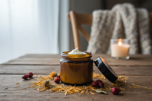 calendula and rosehip whipped tallow ,dark amber 2 oz jar with black lid ,cozy winter scene smooth skin
