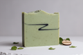 light green handmade soap bar 180 grams with a black line near the top looks like a letter